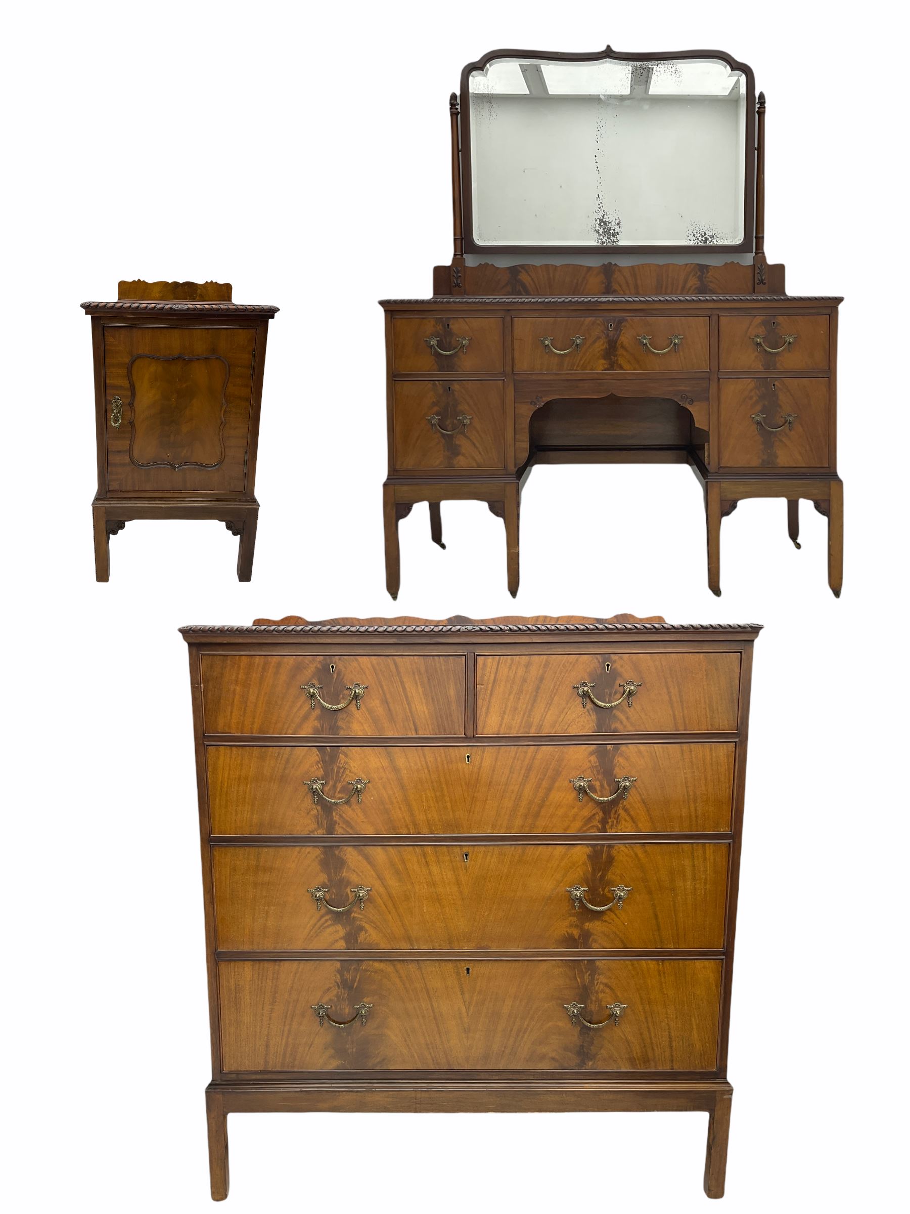 Early 20th century mahogany bedroom suite - dressing table (W122cm, H161cm, D56cm), chest (W107cm, H125cm, D51cm), and bedside cupboard (W44cm, H80cm, D44cm)