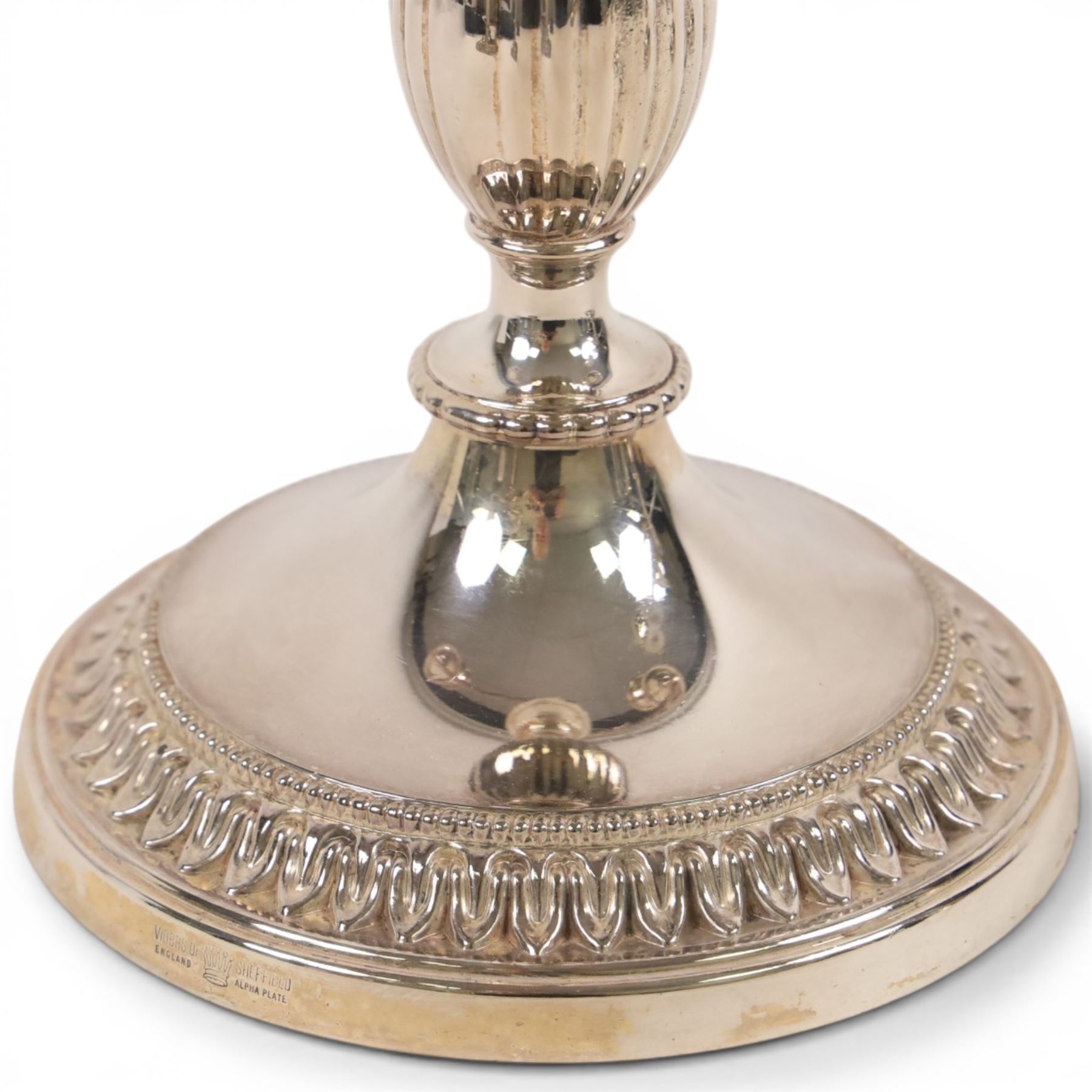 Silver plate two branch candelabra with grape vine decoration to the base, together with a matching pair of candle sticks and other candlesticks  