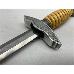 WW2 German Luftwaffe 2nd Pattern Officers dress dagger, with unmarked 25.5cm double edged steel blade, wire-bound pale orange/yellow celluloid grip, globular  pommel with oak leaves and traces of gilding, Luftwaffe eagle cross guard; in beaded scabbard with two suspension rings L43cm overall