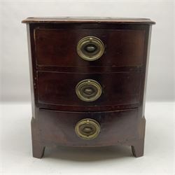 Table top stained wood three drawer chest, with brass loop drop handles, H31.5cm
