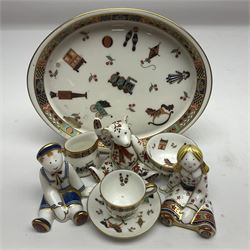 Royal Crown Derby Treasures of Childhood cabaret set, comprising tray, milk jug, sucrier, teacup and saucer, together with two Royal Crown Derby Treasures of Childhood paperweights Fleur and Ragdoll Sailor and Teddy bear paperweight, all paperweights are without stoppers