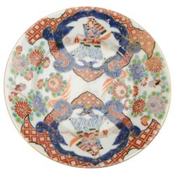 Collection of Japanese and similar ceramics, including pair of Satsuma side plates, decorated with a crowd of figures, blue and white teapot with floral decoration, blue and white vase and plates, etc