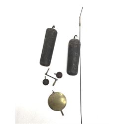 Early 19th century oak longcase clock, shaped pediment over a stepped arch glazed door enclosed by plain pilasters, the case with canted corners and trunk door with sloped arch top and centre curved return, enamel Arabic dial painted with flowers and patterned spandrels, signed 'Jno. Hilbert, Haxby', eight-day movement with subsidiary seconds dial and false calendar dial 