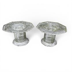 Two French early 20th century painted wicker octagonal garden tables, circular pedestals with parasol opening; with matching side table (3)