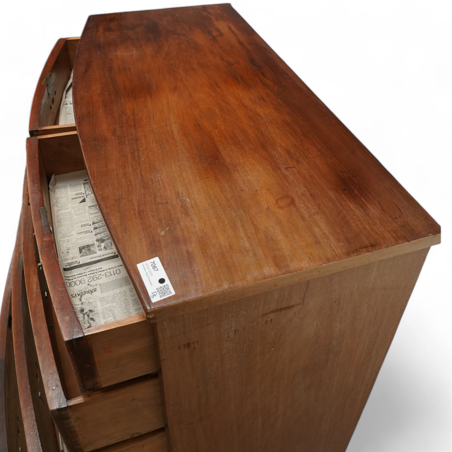 Early 19th century mahogany bow-front chest, two short over three long cock-beaded drawers, on bracket feet