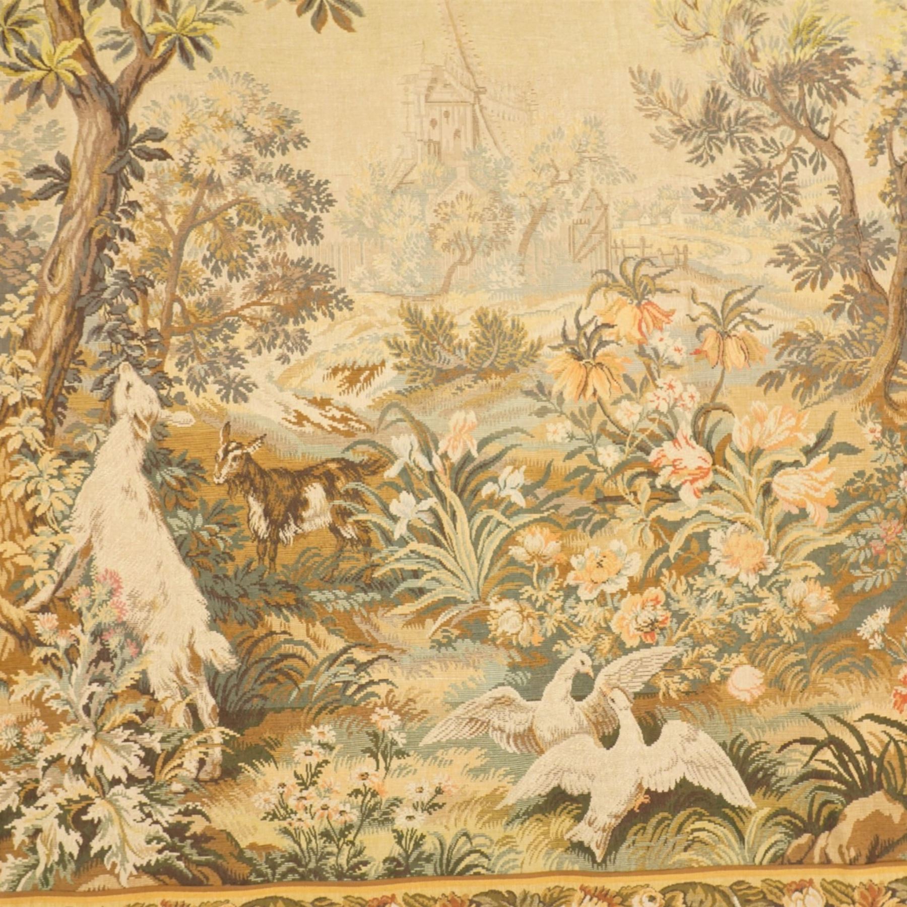 Large French Aubusson style verdure tapestry, of 18th century design but later, depicting rural scene with goats, 155cm x 210cm