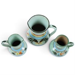 Hartrox Stoneware, comprising five jugs and two bowls, all with green, blue, yellow and oragne floral and abrstact decoration, with printed marks beneath, tallest H26cm