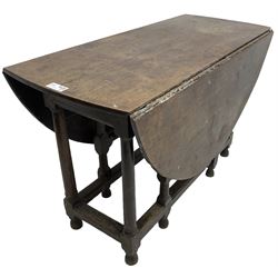 18th century oak dining table, oval drop-leaf top, on turned supports united by moulded stretchers, gate-leg action base