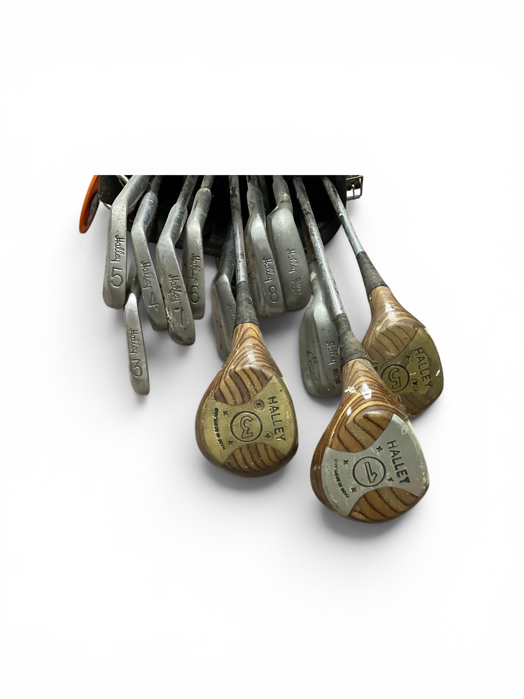 Collection of Halley golf clubs, in bag