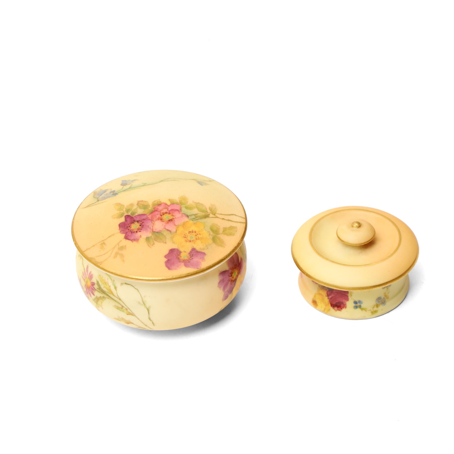 Early 20th century Royal Worcester blush ivory items including jug painted with floral sprays and with gilt handle H14cm, pot pourri with pierced cover, small two handled vase H8cm and two lidded pots (5)