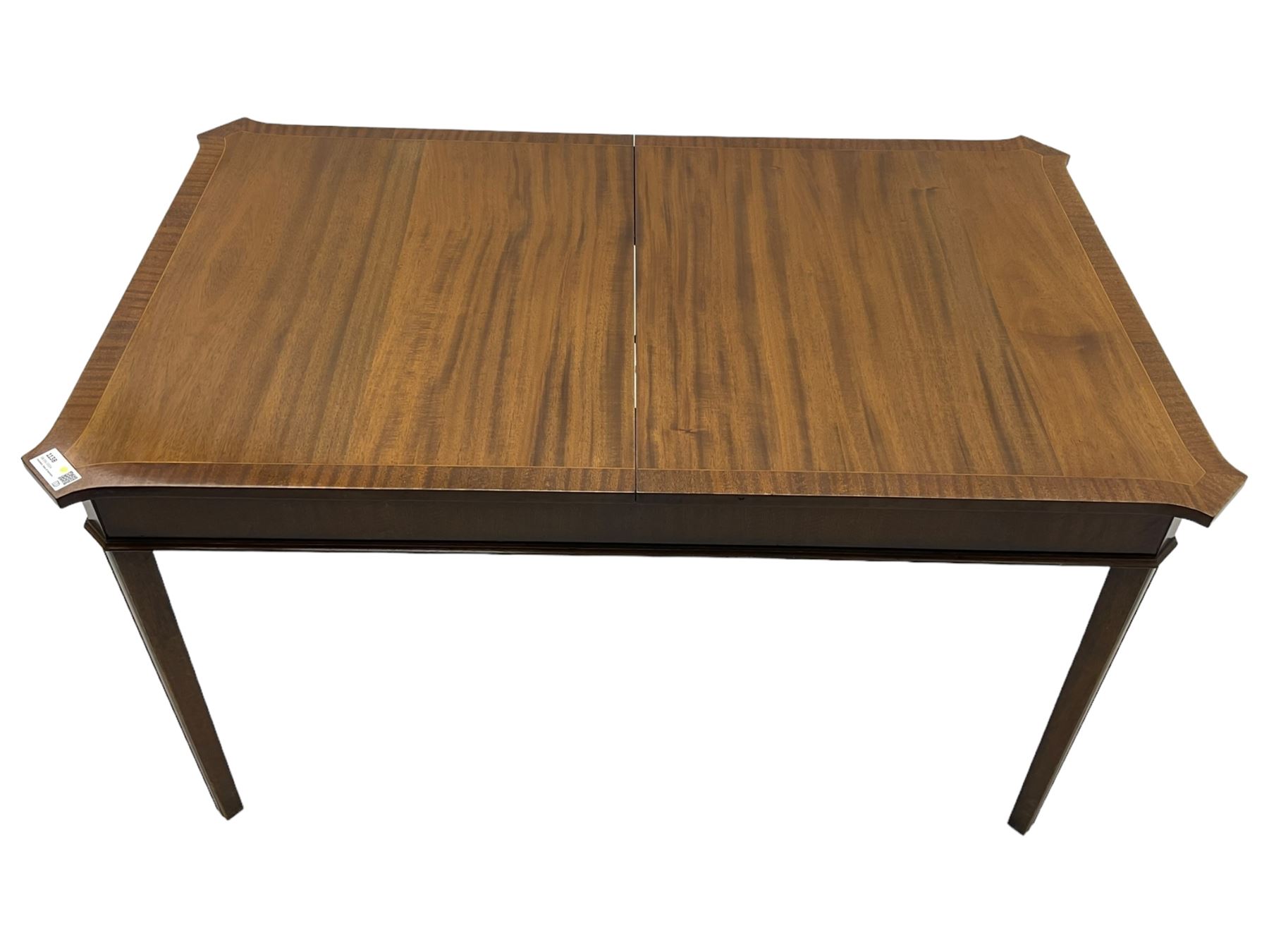 Regency design mahogany extending dining table, rectangular top with extending canted corners, pull-out action with additional leaf (84cm x 136cm - 182cm, H76cm); set of eight Regency design mahogany dining chairs with rope twist rails