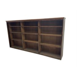 Early to mid-20th century oak bookcase, three sections each with three adjustable shelves