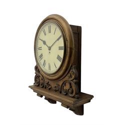 Winterhalter and Hoffmeier -  German oak cased early 20th century fusee wall clock, with a circular wooden surround and a spun brass glazed bezel to the dial, housed on an integral carved bracket with shaped corbel supports, painted dial with Roman numerals, minute track and steel spade hands, dial pinned directly to a four pillar chain driven fusee movement with a recoil anchor escapement. With pendulum and key. 
German fusee movements by Winterhalter and Hoffmeier are comparatively rare, especially housed in carved wall clocks of this description. 