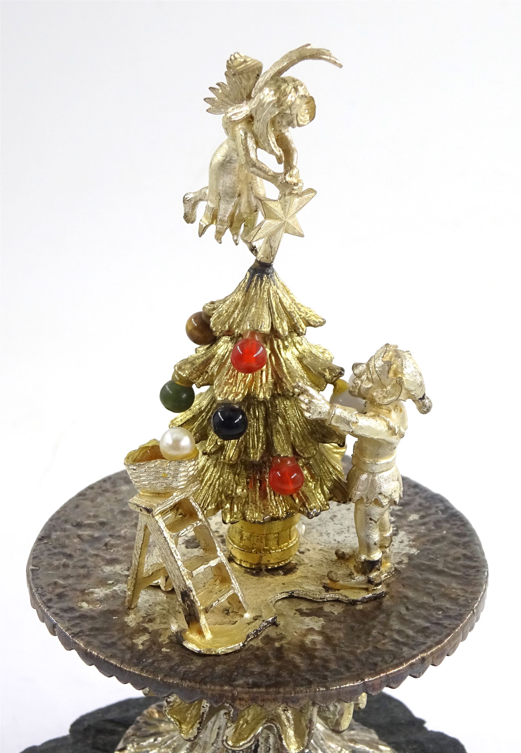 Christopher Nigel Lawrence limited edition silver and parcel gilt surprise mushroom, the textured domed cover opening to reveal two elves decorating a semi-precious gem set Christmas tree, upon a slate base, no 100/250, hallmarked Christopher Nigel Lawrence, London 1980, overall H9cm