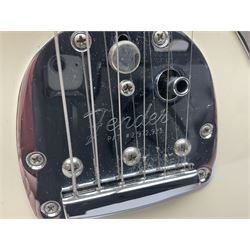 Mexican Fender Jaguar electric guitar with Humbucker pick-ups and tremolo arm, serial no.MX16741977, L101cm; in soft carrying case