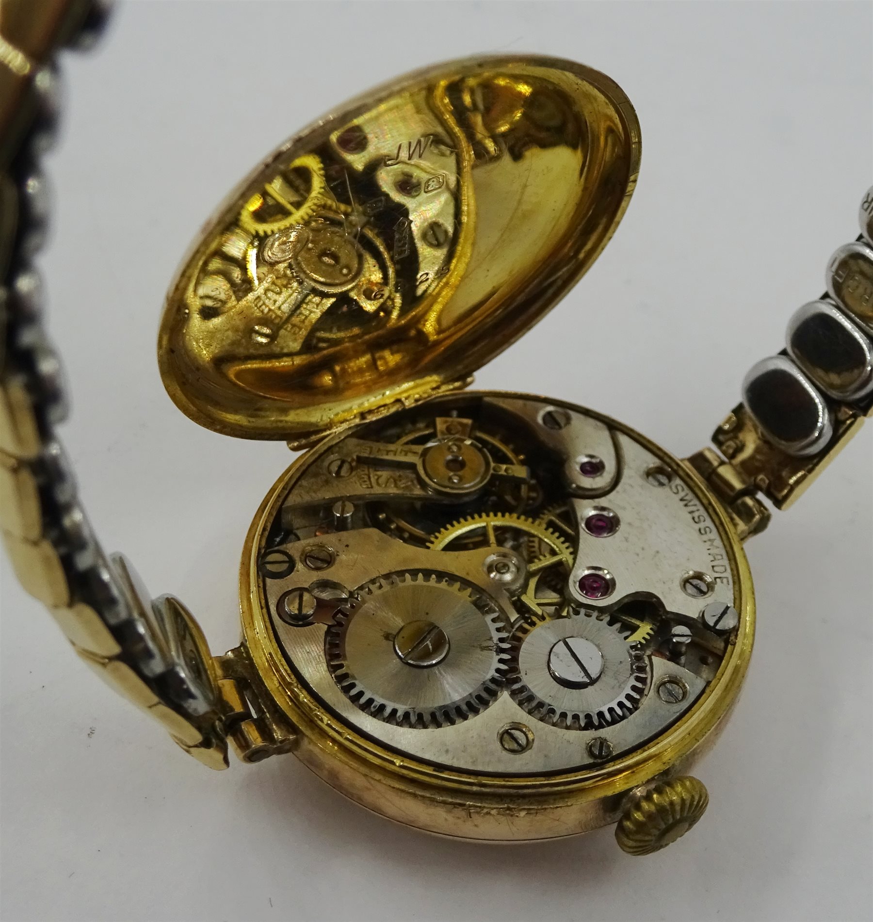 Roamer 9ct gold gentleman's wristwatch, London 1951, Marvin 9ct gold wristwatch and a ladies 9ct gold wristwatch, hallmarked, both on expandable gilt straps