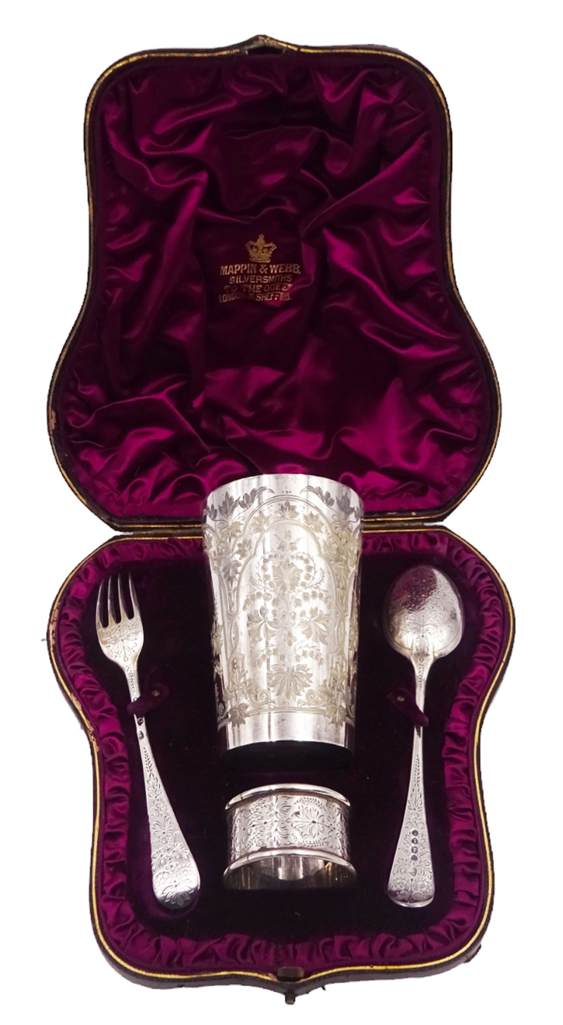 Victorian silver four piece christening set, comprising a beaker mug, napkin ring, fork and spoon, with bright cut floral decoration and monogrammed initials to each item, mug hallmarked Mappin & Webb (John Newton Mappin), Sheffield 1884, within tooled leather fitted case