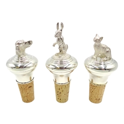  Shop stock: Silver bottle stoppers in the form of a dog's head, a hare and a cat  by L R Watson Birmingham 2006-2009 boxed (3)  