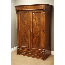  Early 20th century French walnut double wardrobe enclosed by two panelled and figured doors, with drawer, W117cm, H172cm, D61cm  