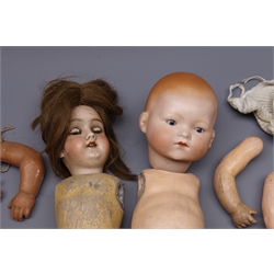  Kley Hahn 'Walkure' bisque head doll with applied hair, sleeping eyes, open mouth with teeth and composition body with detached jointed limbs (one leg missing), marked '250 KH Walkure 21/4 Germany' and an Armand Marseille bisque head baby doll marked 'AM Germany 341/6K' with disassembled composition body (2)  