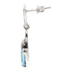 Pair of silver blue stone and marcasite pendant stud earrings, stamped 925 