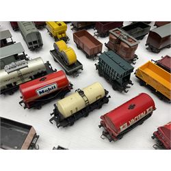 Hornby Dublo - forty-three goods wagons including nine tank wagons (Esso, Mobil, Vacuum, UD and Traffic Services), brake vans, meat and fish wagons, bogie well and bolsters, cable drums, open wagons, salt and grain wagons, etc; and six others by Tri-ang etc; all unboxed (49)