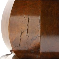 Victorian figured and burr walnut loo table, oval book-matched veneer top with moulded edge, over a turned octagonal pedestal terminating to four splayed supports with flowerhead carved knees and scroll feet with castors
