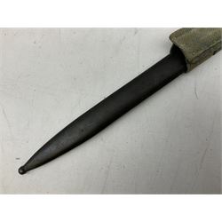 Italian Model 1891 Carcano knife bayonet with 30cm fullered steel blade, the cross-piece stamped VL1110; in steel scabbard with webbing frog L43cm overall; and another Italian fighting knife/bayonet in brass bound leather scabbard (2)