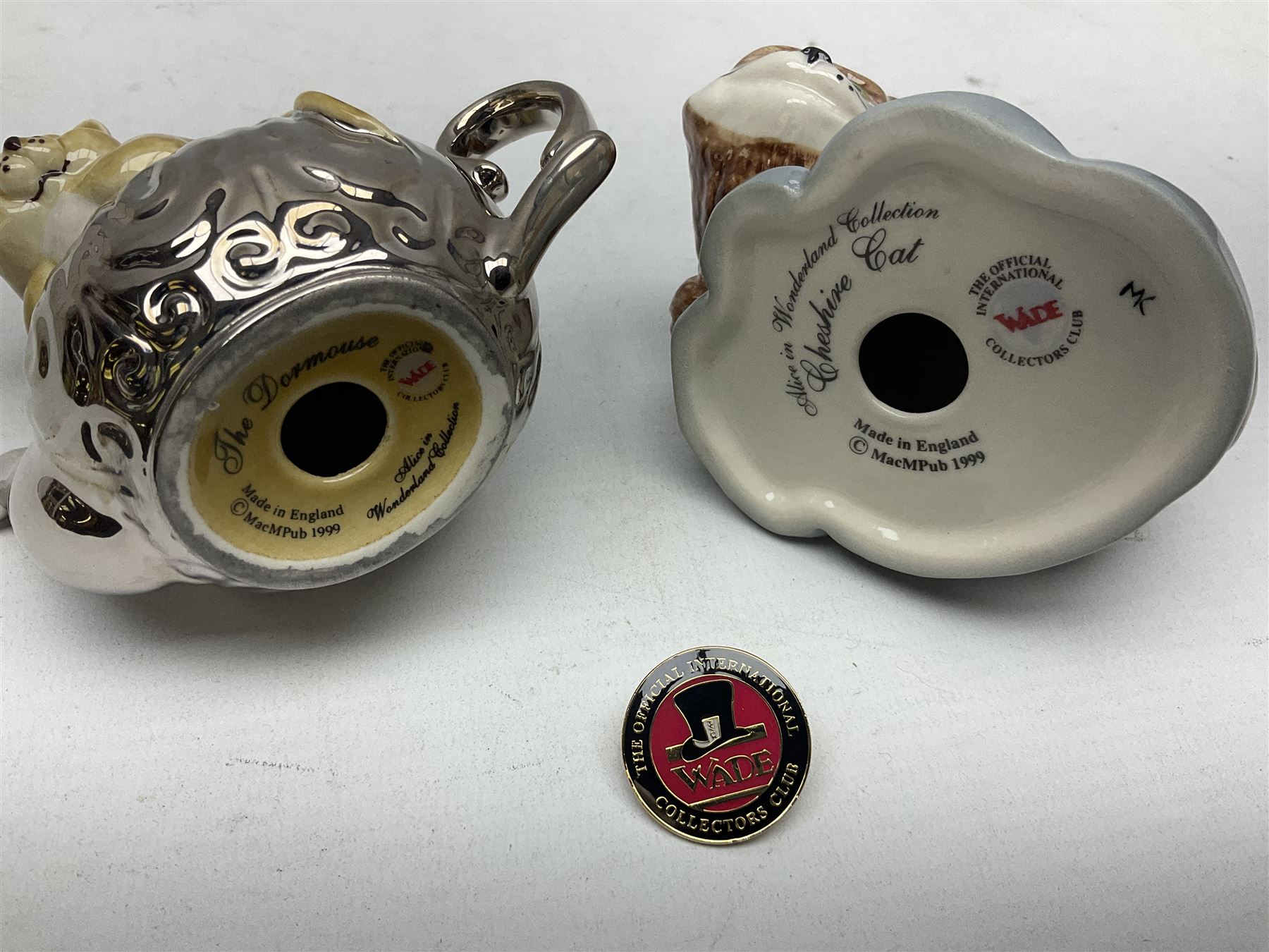 Thirteen Wade Collectors Club figures, comprising six Alice in Wonderland figures; Queen of Hearts, Alice, Mad Hatter, The Doormouse, White Rabbit and Cheshire cat, six Cinderella figures; Fairy Godmother, Cinderella Ready for the Ball, Prince Charming, Cinderella, Clorinda and Thisbe, together with Beauty from Beauty and the Beast, all with original boxes  