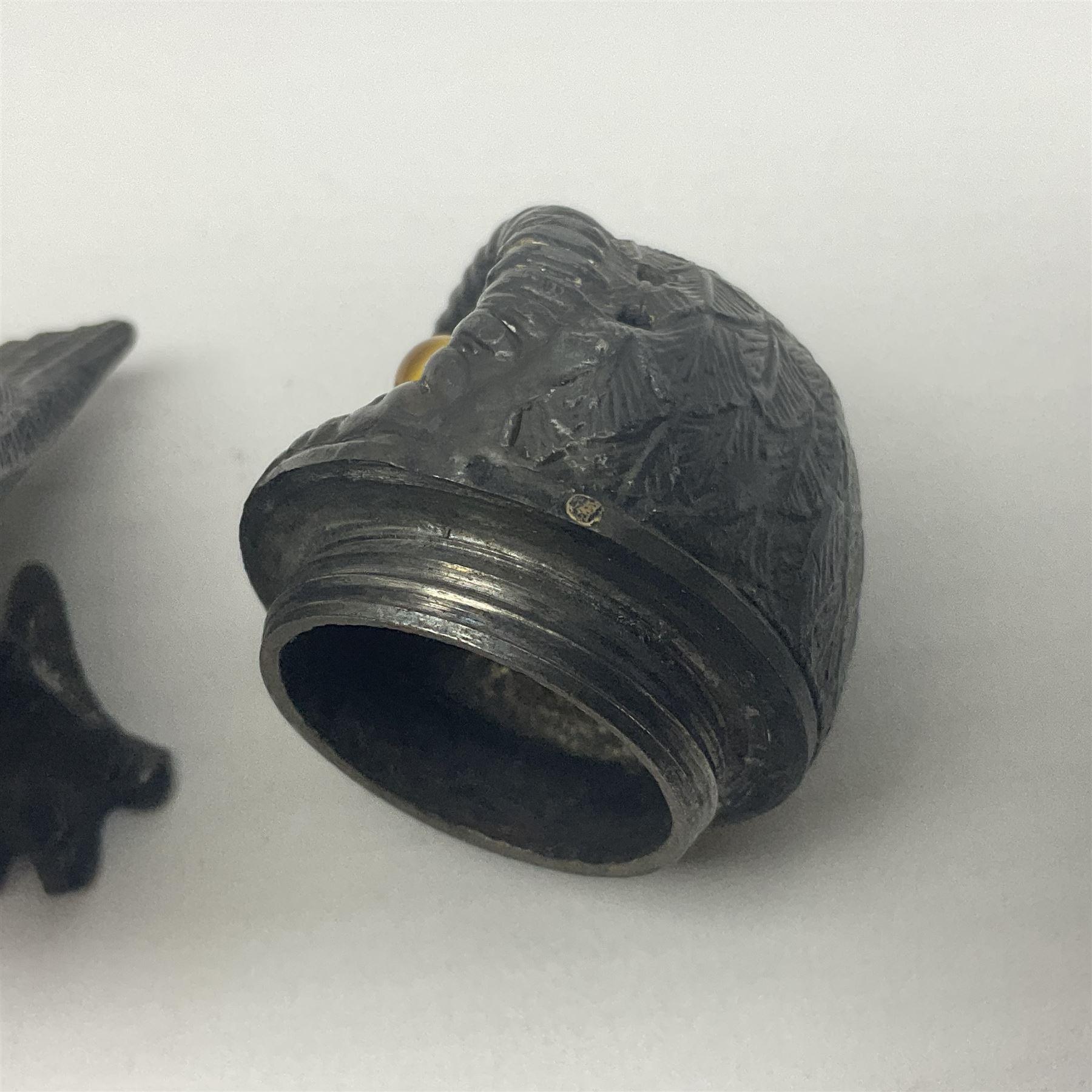 Novelty pewter pepper shaker in the form of an owl with screw off head and glass eyes