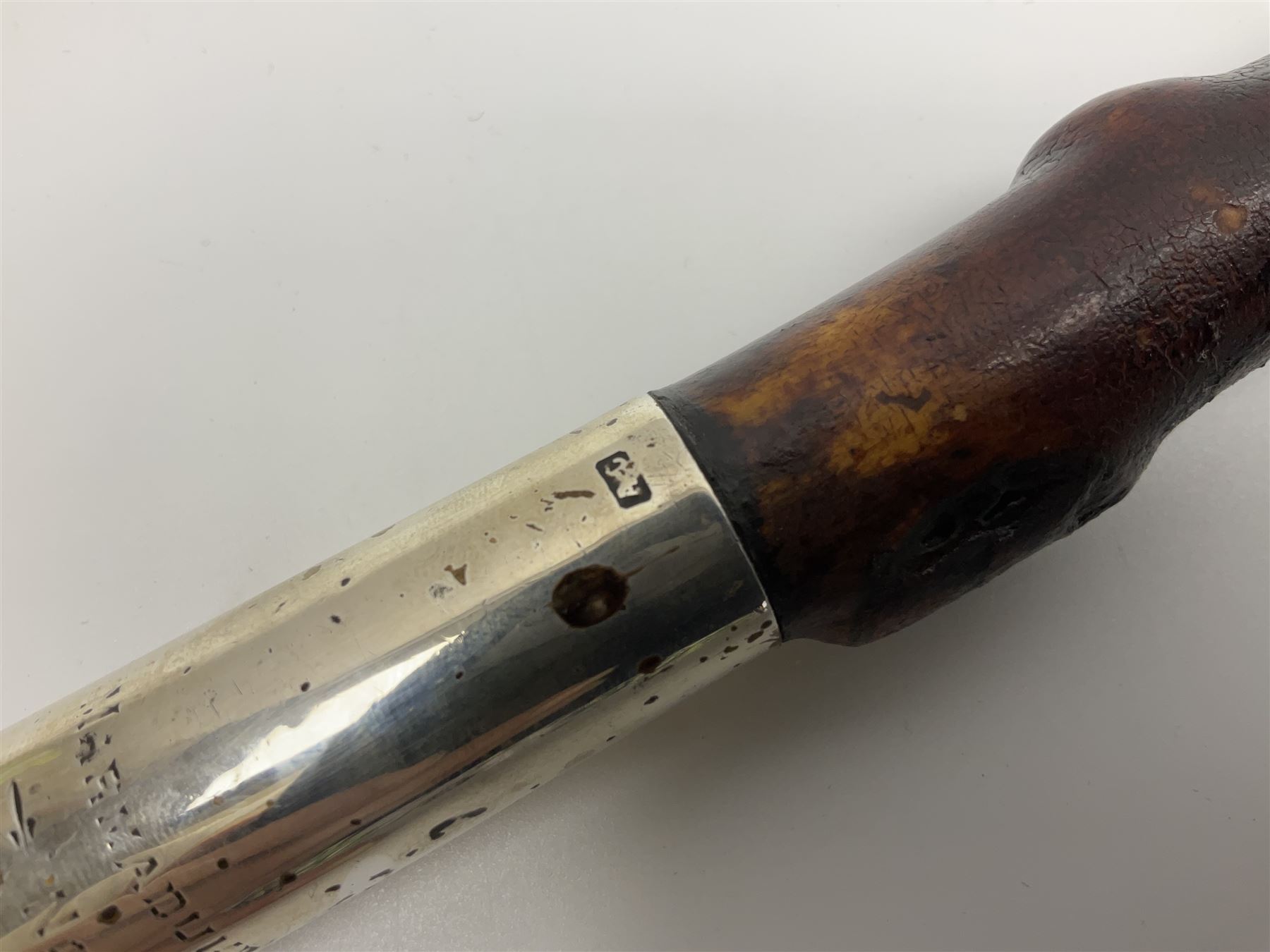 Victorian trap/coaching whip, principally in blackened thorn wood, with a silver cap engraved 'Marmaduke Furness Esquire Nov 1st 1904', hallmarked London 1900, makers mark AC, L173cm 