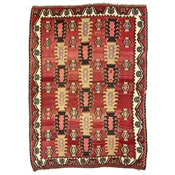 Large  red ground Kilim rug or wall hanging, decorated with geometric patterns and dated within the weave '1969'