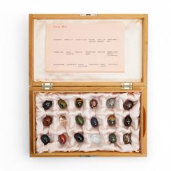 Collection of approx ninety named semi precious stone eggs in five Dunhill cigar boxes 