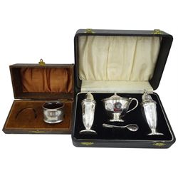 Silver three piece cruet set with engraved initial 'C' by Viner's Ltd, Sheffield 1951 and a silver napkin rings, cased