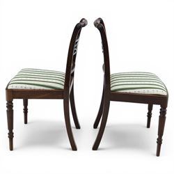 Pair of 19th century mahogany dining chairs, the wrythen top rail above a pierced splat and reeded side supports, above a white and green upholstered drop in seat, upon turned and reeded front and plain back legs