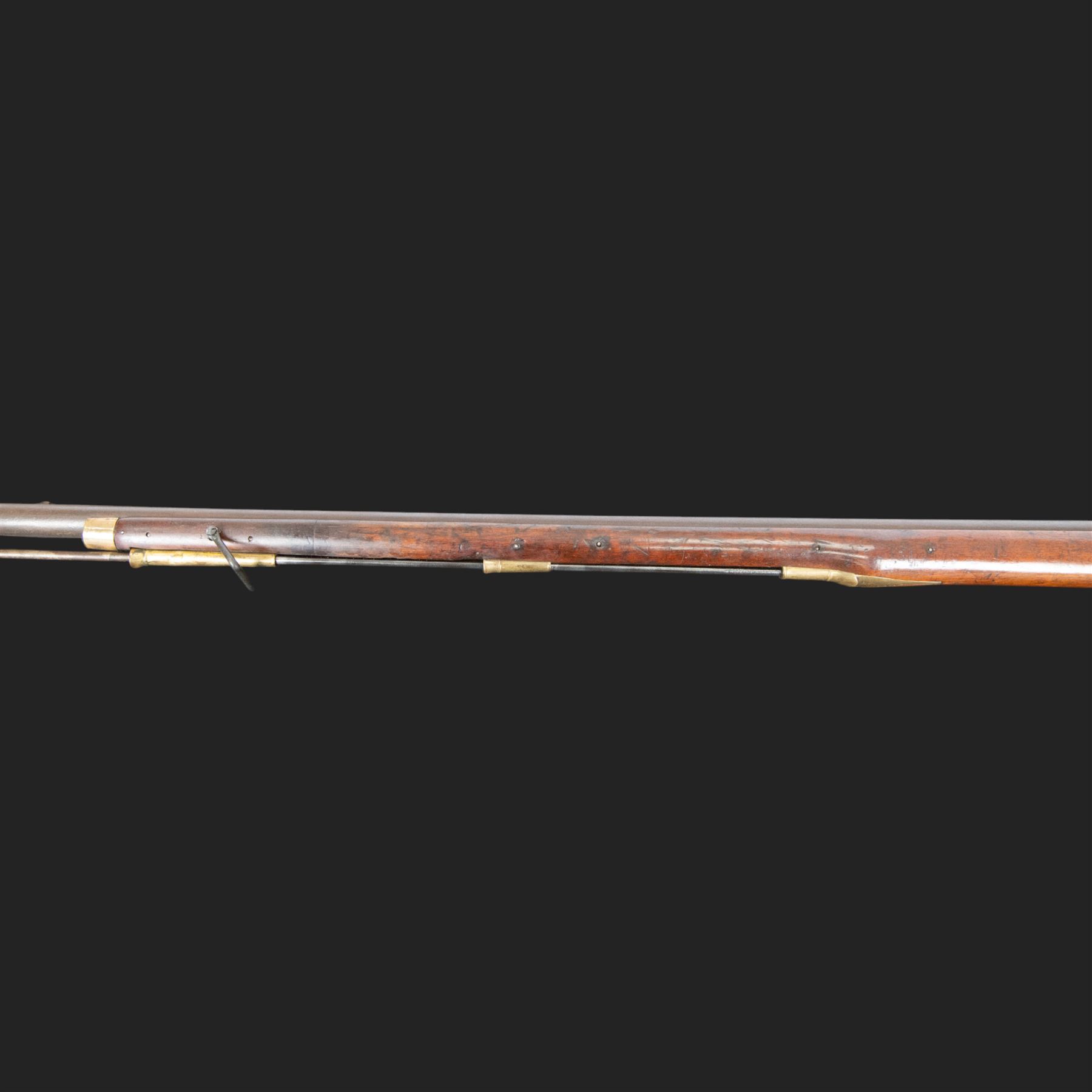 Brown Bess flintlock musket, 37in barrel, action marked with crowned GR and Tower, with brass mounts, the thinned butt marked 38, sling swivels, steel ramrod, overall L132cm
