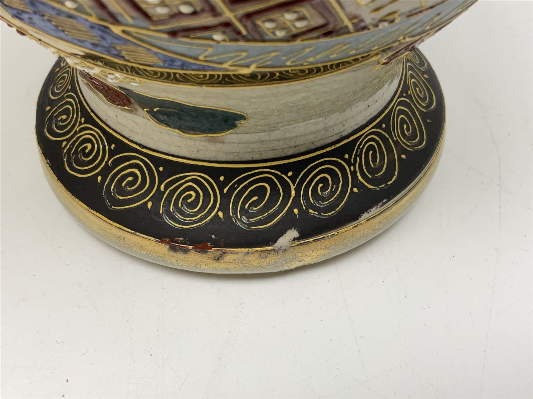 Pair of early 20th century Japanese Satsuma vases, decorated with immortals, with painted mark to base, H26cm