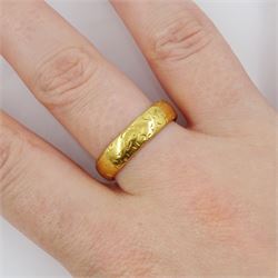 22ct gold wedding band, with engraved foliate decoration, Birmingham 1956