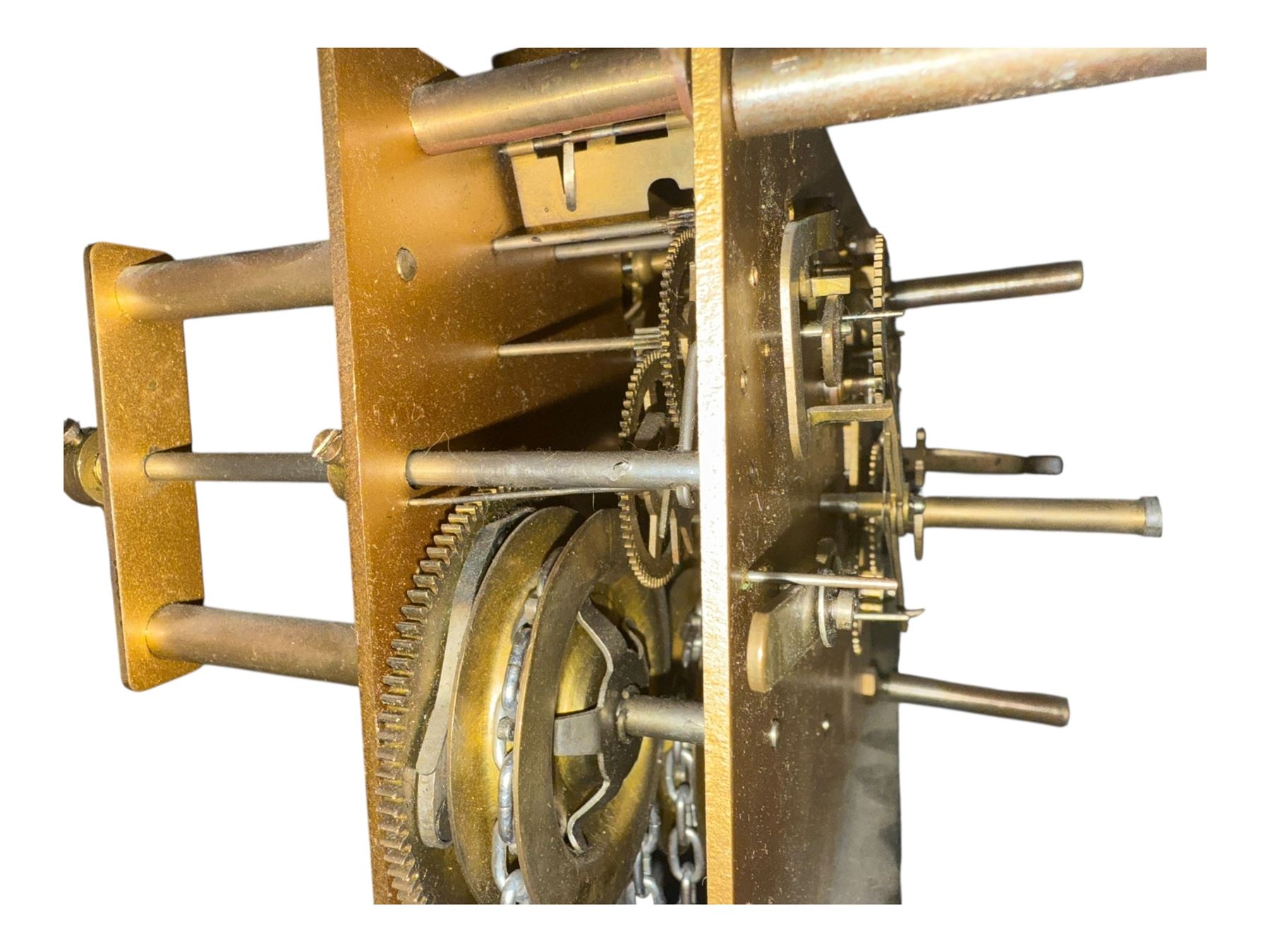 English- Art deco mahogany 8-day longcase clock, with an arched top and fill length fully glazed door beneath, on a short plinth with bracket feet, three train chain driven movement with visible stainless steel cased weights and pendulum, silvered dial with Arabic numerals, minute track and pierced steel hands, quarter chiming movement with  Westminster/ Whittington/ strike/silent selection.
