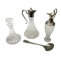 Serving spoon stamped 800, together with a two claret jugs and a decanter, in one box 