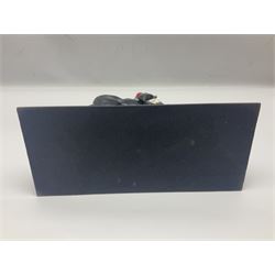 Mounted Lifeguard upon a black horse, in the style of Beswick, upon a wooden plinth, H31cm