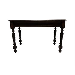 Late 19th century oak side table, rectangular top with shaped edge over faux panelled frieze, raised on arcade carved and ring turned supports 