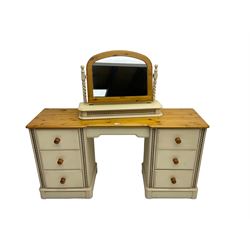 Pine and painted finish twin pedestal dressing table, fitted with central frieze drawer and six short drawers with spiral turned uprights, latte finish (152cm x 45cm x 77cm); with matching swing mirror raised on spiral turned uprights over trinket compartment with hinged lid (78cm x 22cm x 56cm)