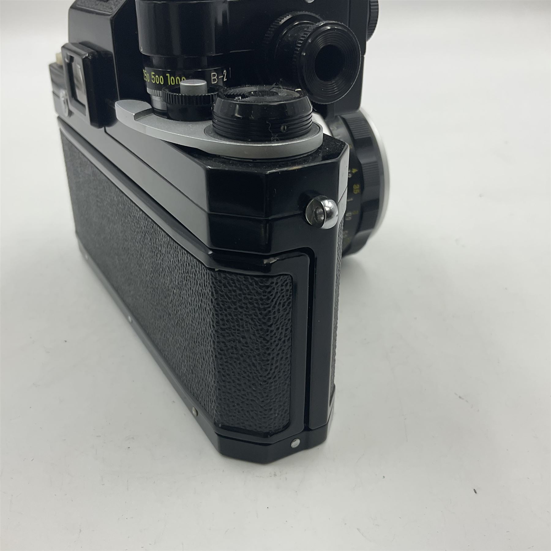 Nikon F Photomic camera body, serial no. 6543350, circa 1964, with 'Nikon NIKKOR-H Auto 1:2 f=50mm' lens, serial no. 1002112