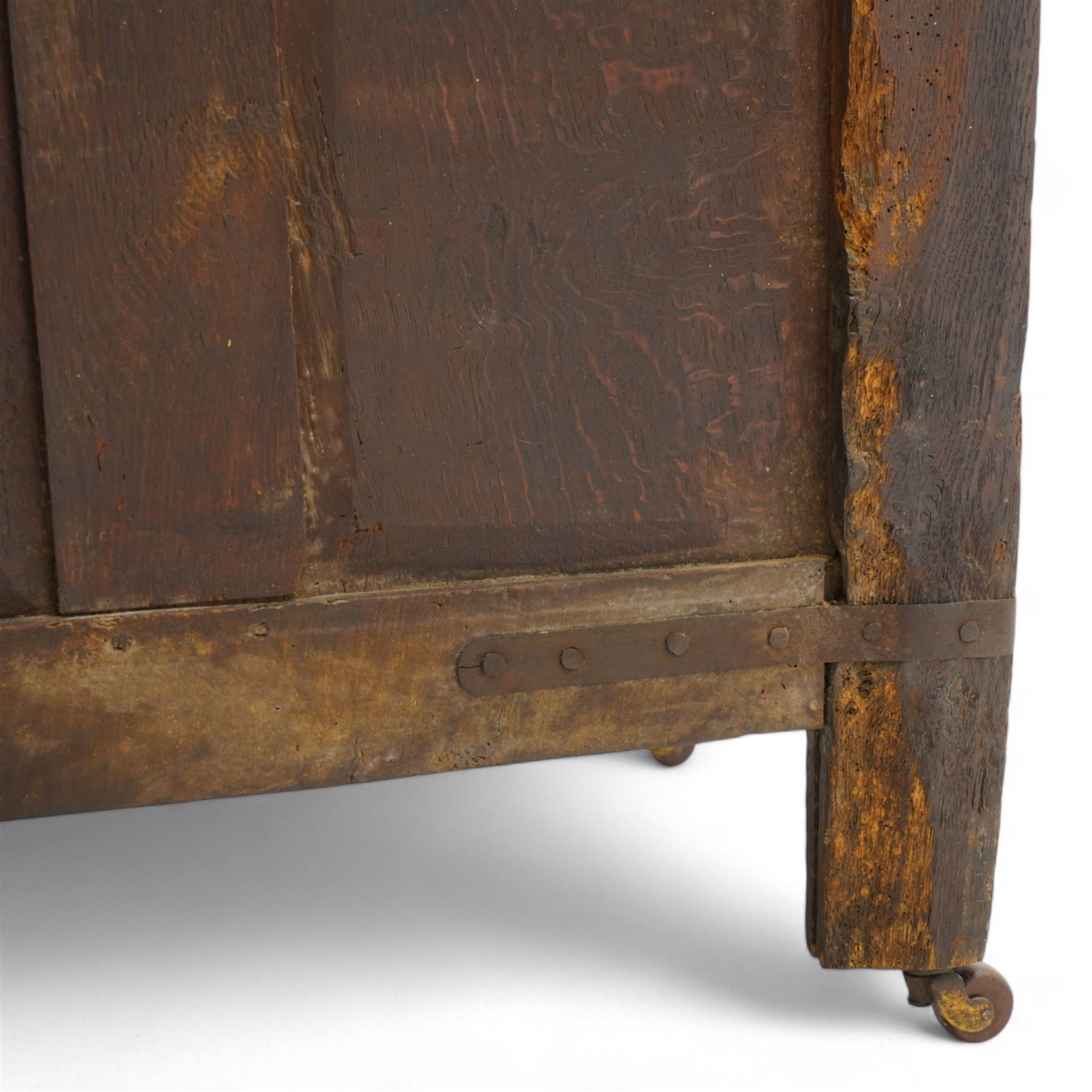 18th century oak blanket box, moulded rectangular hinged lid over lunette carved frieze rail and panelled front, moulded frame and panelled sides fitted with carrying handles, on stile supports