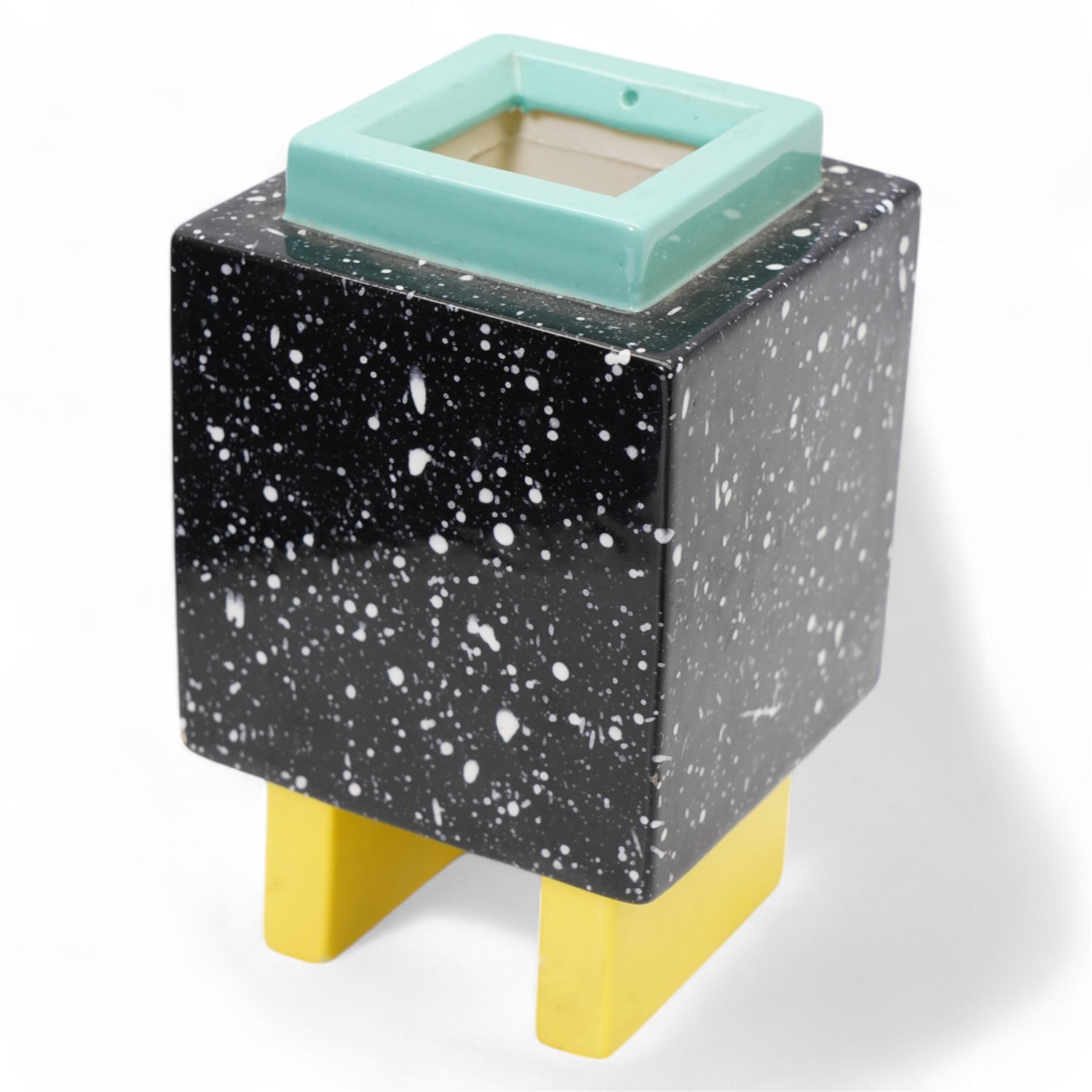 Poole pottery bowl, decorated internally with an abstract black and orange pattern, against a red ground, D27cm, together with a Christina Gray model of a Cheshire cat and an Art Deco vase (3)