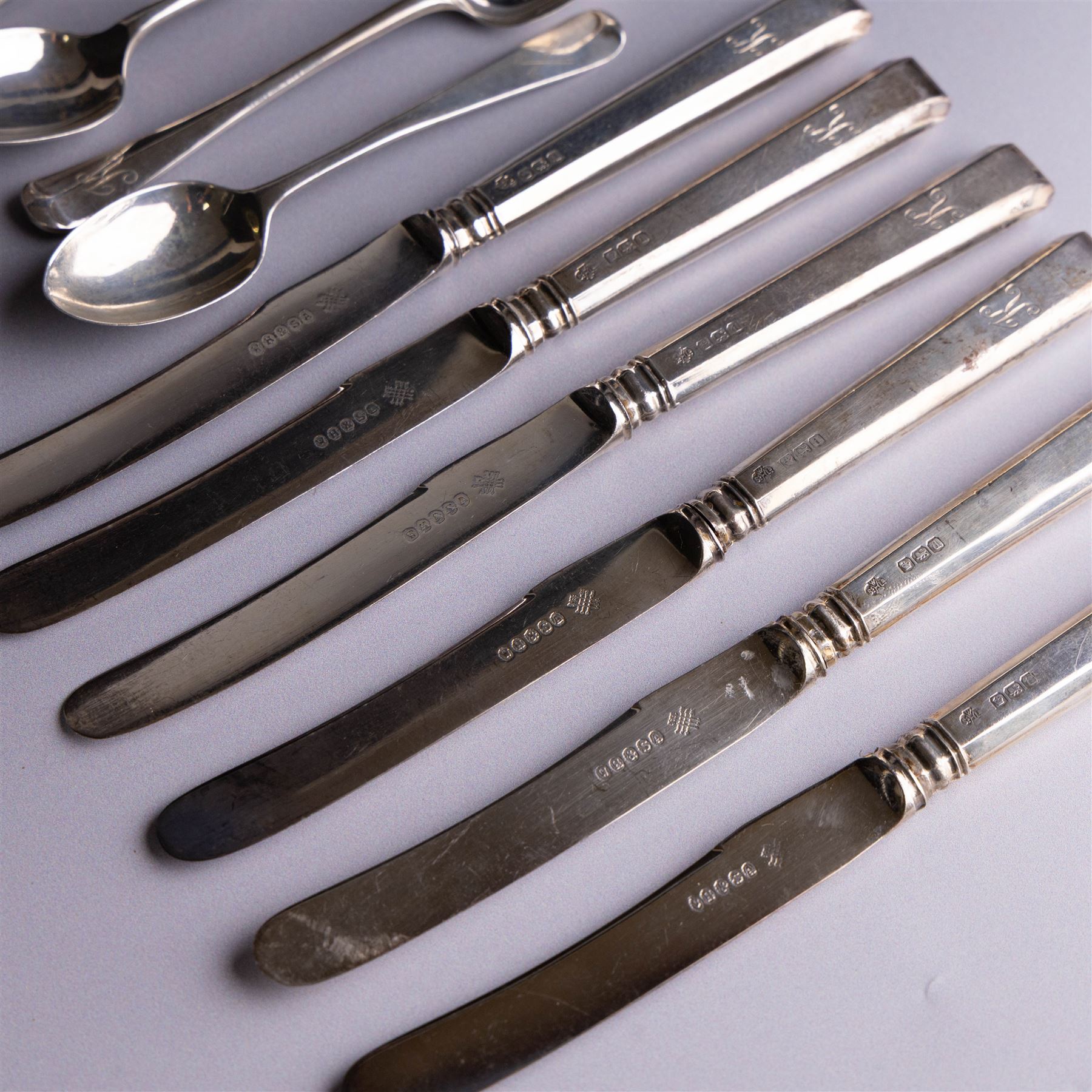 Set of six silver teaspoons with engraved initial K to finial, together with a set of six silver handled tea knives and one further silver teaspoon, all hallmarked