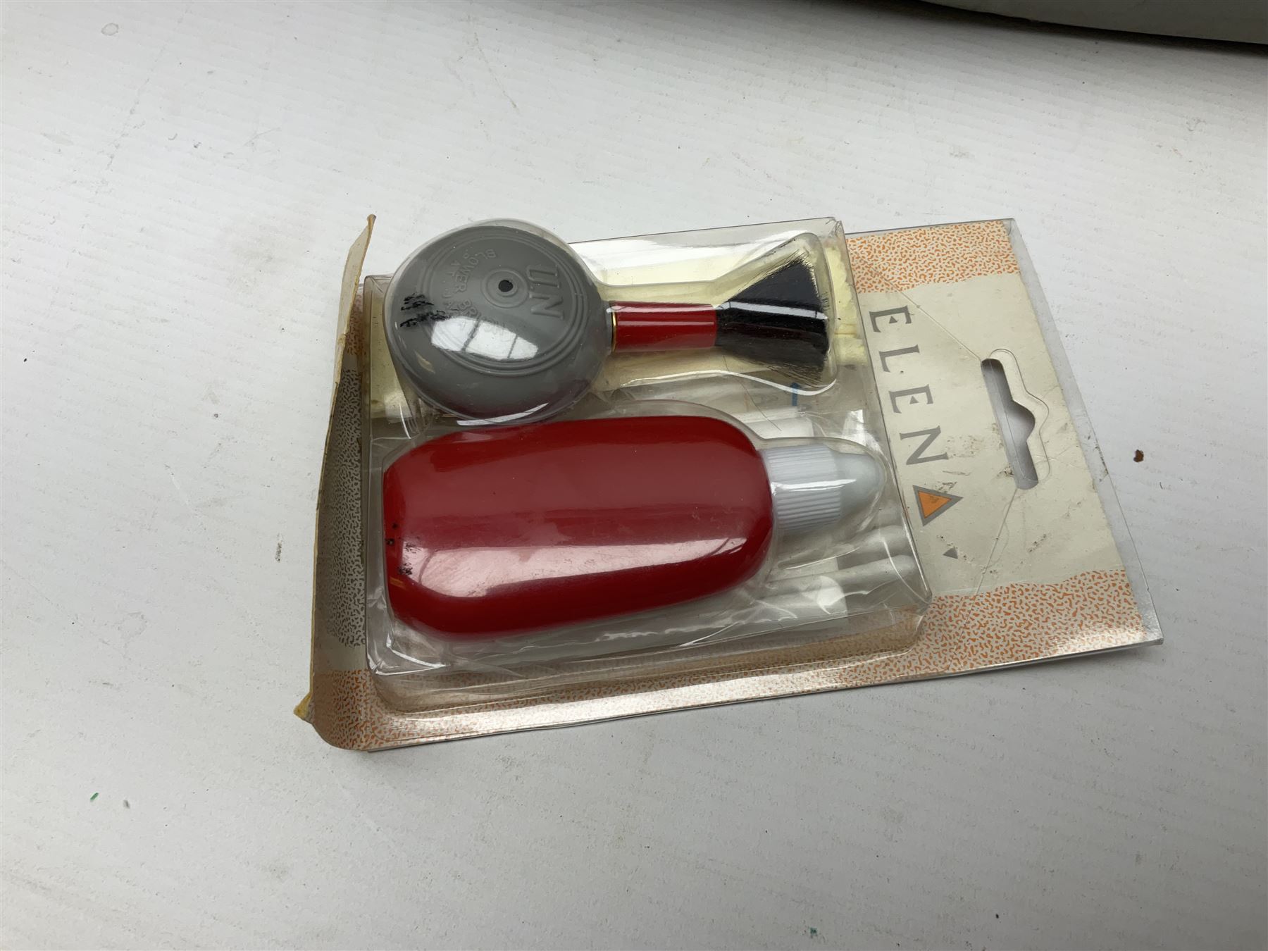 Canon A1 35mm camera body serial no 741264, with 'Tokina AT-X 28-85mm 1:3.5-4.5' lens serial no 821679, 'Canon FD 50mm 1:1.8mm' lens and other camera equipment 