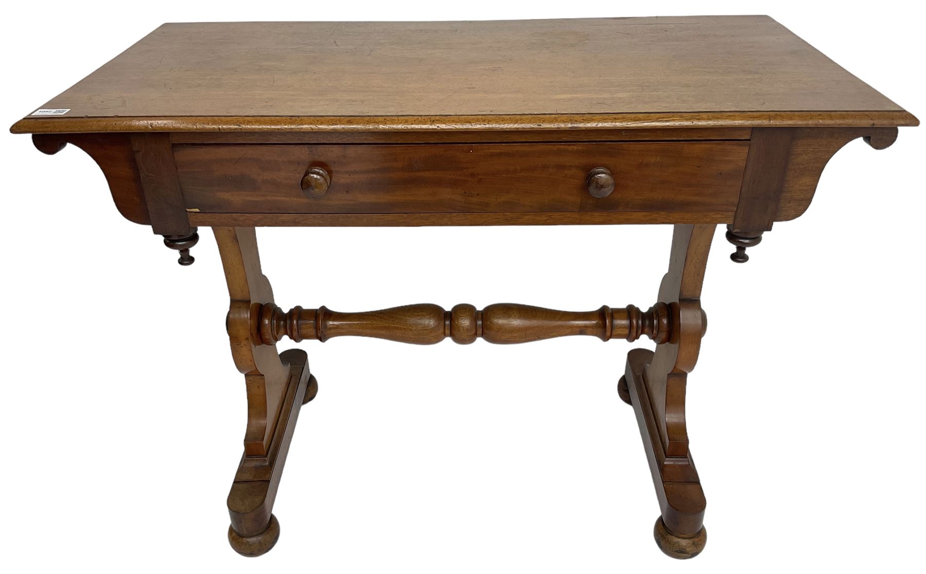 Victorian design mahogany side table, fitted with single drawer, raised on shaped end supports with bun feet, united by turned stretcher