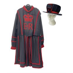 Elizabeth II Yeoman Warders (Beefeater) No.1 Undress blue uniform - comprising tunic bearing label Crown Military Uniforms H.M. Tower of London and bonnet by S. Patey (2) 